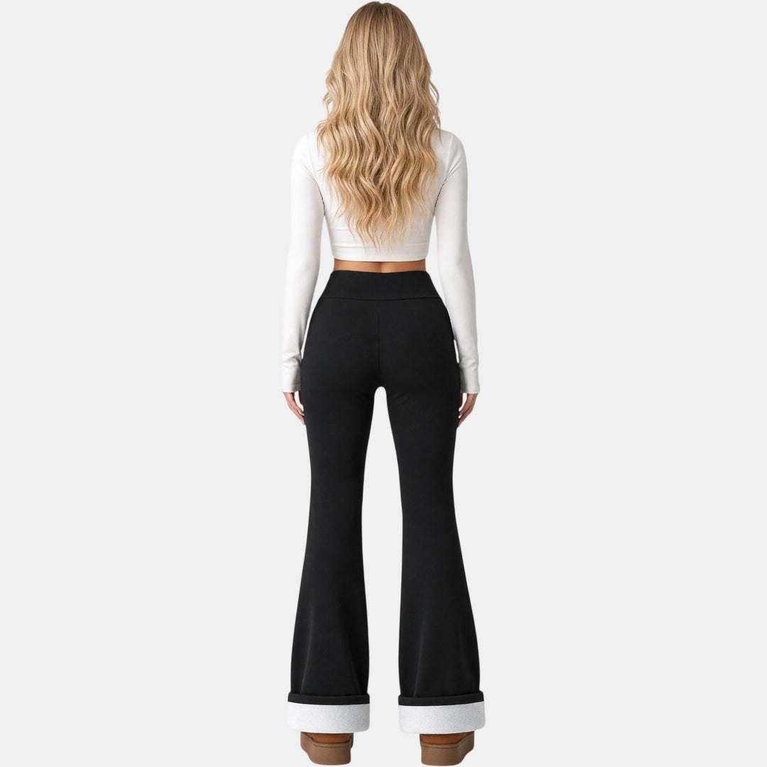 Black fleece lined flare leggings back view showing fleece cuff